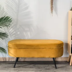 Bank van metaal en geel mosterdfluweel