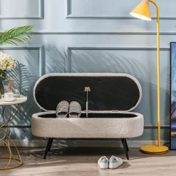 Metalen bank met witte krullen