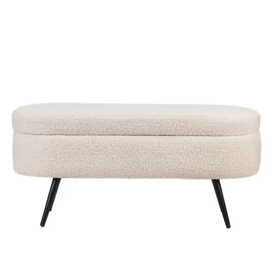 Metalen bank met witte krullen