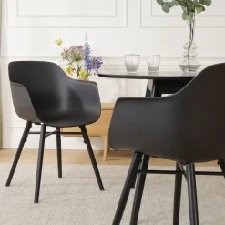 Nolon Nena-Puk Eetkamerstoel Zwart - Armleuning - Zwarte Houten Poten