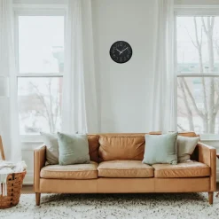 Ostaria Wandklok/muur klok - D25 cm - kunststof - zwart