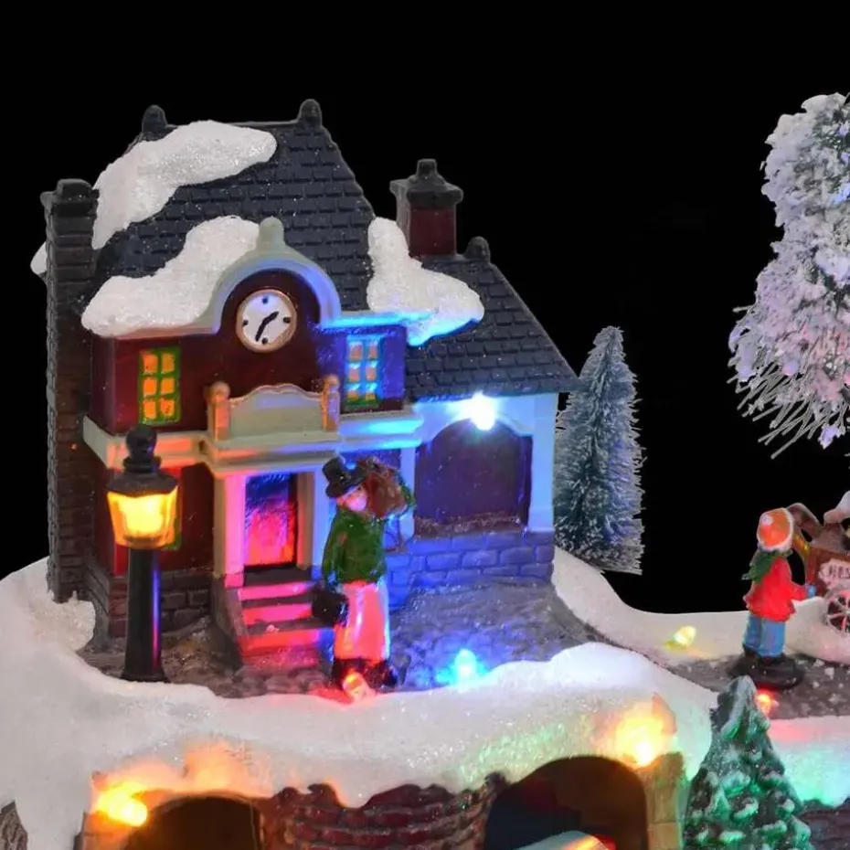 vidaXL - Miniatuur kerstdorp met treinstation - 23,5x16x18,5 cm - Hars