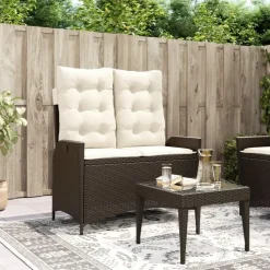 vidaXL - Verstelbare loungebank met crème kussens - Bruin rattan - 104x59x93 cm
